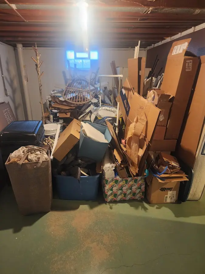 Roll-off dumpster container at job site for 15 Yard Dumpster Rental in Machesney Park